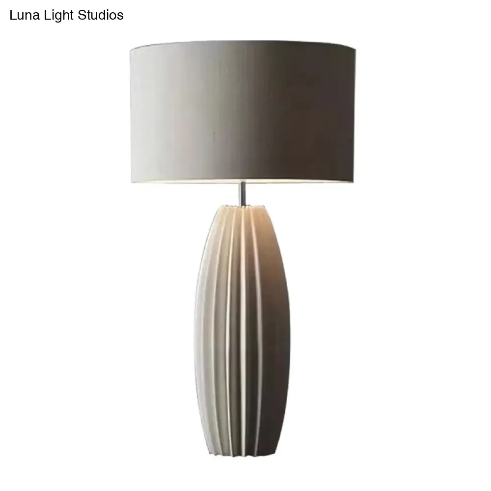 Contemporary 1-Light Ceramic Night Light with Grey Fabric Shade - Modern Drum Nightstand Lamp