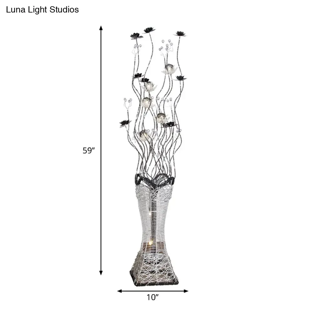 Contemporary Torch-Like LED Floor Light with Curvy Arm and Floret Decor in Black/Silver