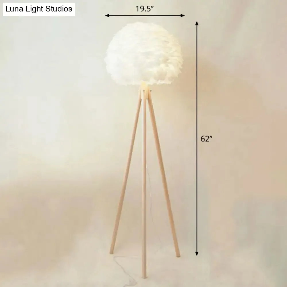 Minimalist White Dome Floor Lamp with Feather Detail and Wood Tripod Base