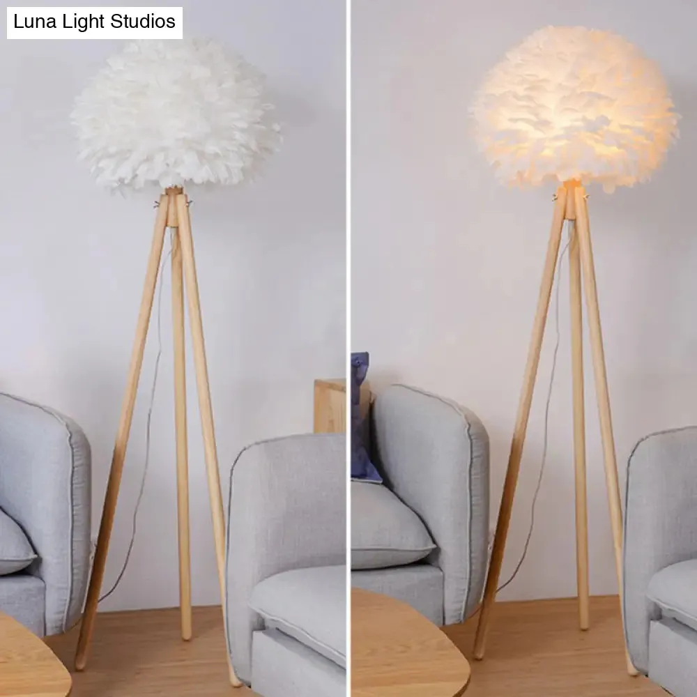 Minimalist White Dome Floor Lamp with Feather Detail and Wood Tripod Base